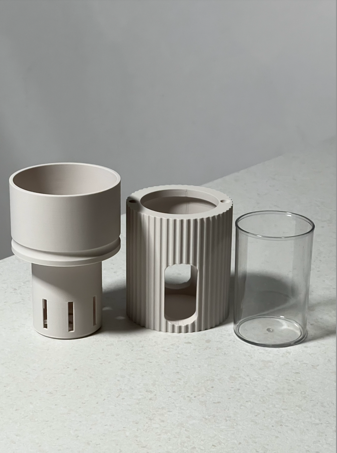 Midia self-watering plant pot in Soft Linen shown deconstructued with acrylic liner and inner basket, 3D printed in Cornwall UK, designed for LECA and PON growing
